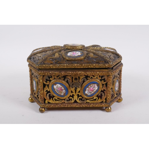 34 - A C19th French pierced ormolu jewellery casket with inset Sevres porcelain floral plaques and velvet... 