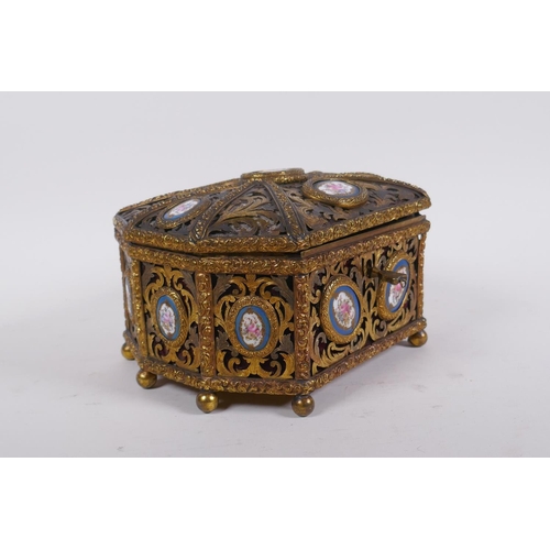 34 - A C19th French pierced ormolu jewellery casket with inset Sevres porcelain floral plaques and velvet... 