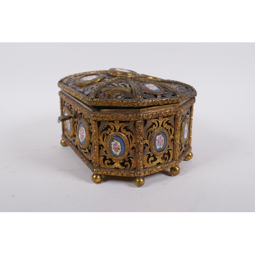 34 - A C19th French pierced ormolu jewellery casket with inset Sevres porcelain floral plaques and velvet... 