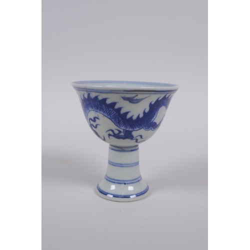 35 - A Chinese blue and white porcelain stem cup with dragon decoration, Xuande 6 character mark to base,... 