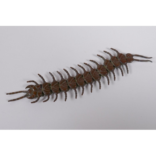 40 - A Japanese jizai style bronze okimono centipede with articulated segments, 15cm long