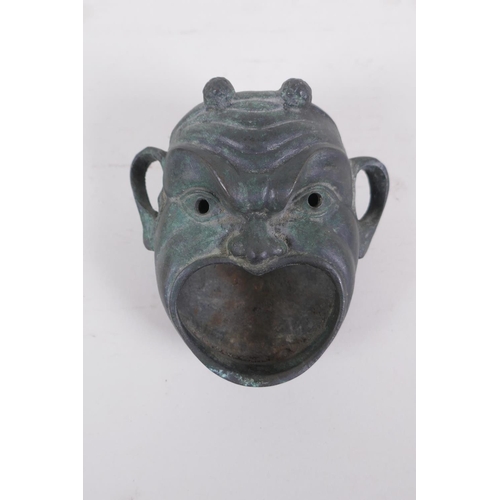 46 - An antique Japanese bronze satyr mask censer, 11 x 11cm