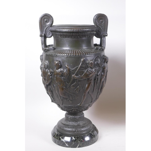 5 - A pair of Grand Tour bronze urns on marble bases, decorated with Greco Roman figures, 41cm high