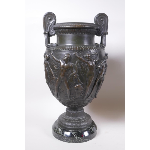 5 - A pair of Grand Tour bronze urns on marble bases, decorated with Greco Roman figures, 41cm high