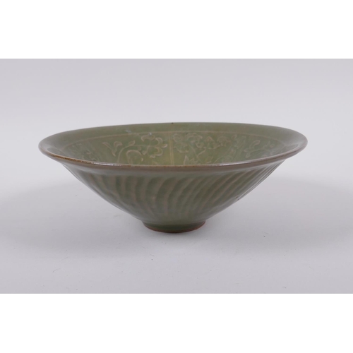 53 - A Chinese Song style olive glazed pottery conical bowl, with underglaze figural decoration to the bo... 