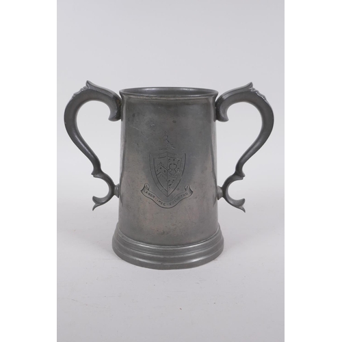 57 - An antique twin handled pewter trophy for the Cambridge Caius College boat club senior trial eights,... 