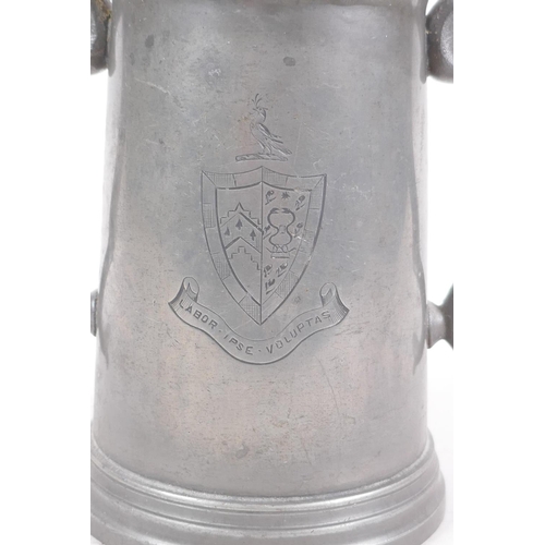 57 - An antique twin handled pewter trophy for the Cambridge Caius College boat club senior trial eights,... 