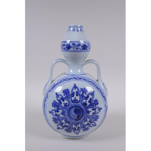 68 - A blue and white porcelain garlic head shaped flask with two handles and Yin Yang decoration, Chines... 