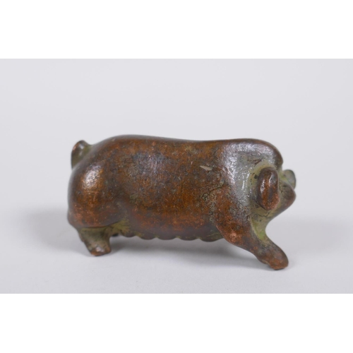 70 - A Japanese style bronze okimono pig, 6cm long