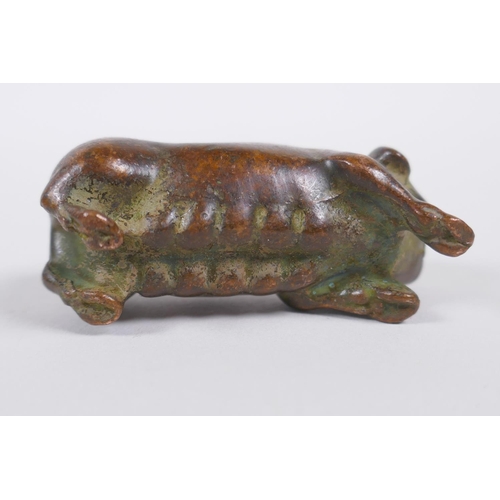 70 - A Japanese style bronze okimono pig, 6cm long