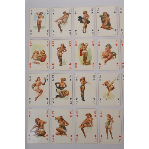 79 - A collection of assorted retro Playboy collectors' cards, and a set of pin-up playing cards, 6 x 9cm