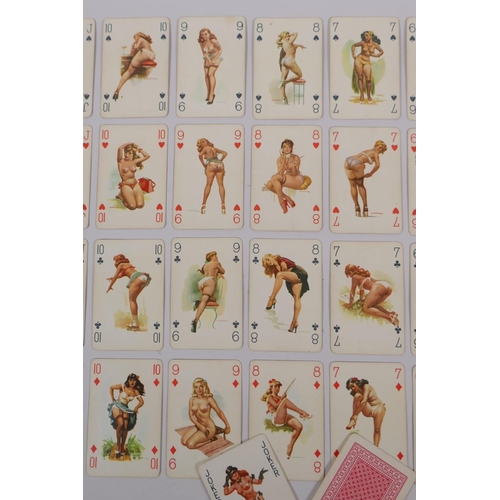 79 - A collection of assorted retro Playboy collectors' cards, and a set of pin-up playing cards, 6 x 9cm