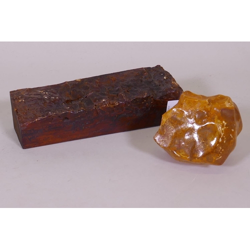 9 - A natural amber specimen on tree bark, 26 x 8 x 7cm, and another, 10cm high