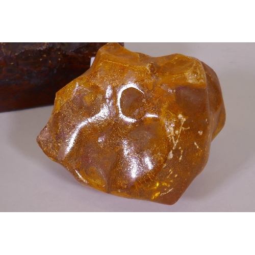 9 - A natural amber specimen on tree bark, 26 x 8 x 7cm, and another, 10cm high