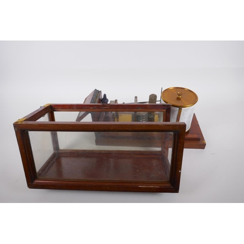 10 - An early C20th Negretti and Zambra mahogany cased barograph, the hinged glazed top, AF, in need of r... 