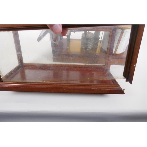 10 - An early C20th Negretti and Zambra mahogany cased barograph, the hinged glazed top, AF, in need of r... 