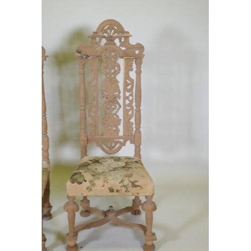 1013 - A pair of French C19th oak high back chairs with carved and pierced backs, 128cm high, AF