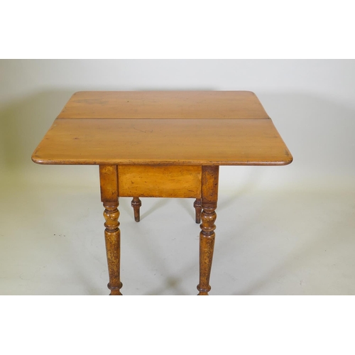 1017 - A Victorian satin walnut tea table, with fold over top, raised on turned supports, 88 x 44 x 75cm