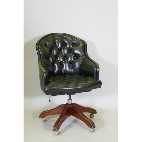 1021 - A button back leather tilt and swivel office desk chair