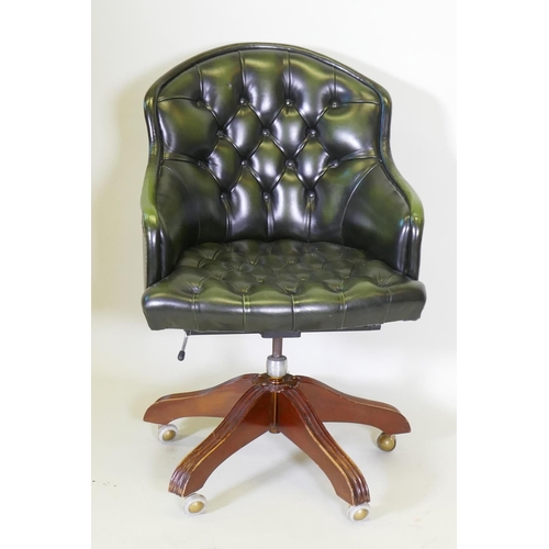 1021 - A button back leather tilt and swivel office desk chair