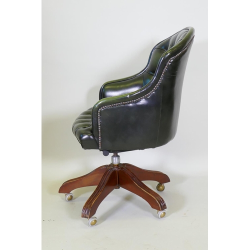 1021 - A button back leather tilt and swivel office desk chair