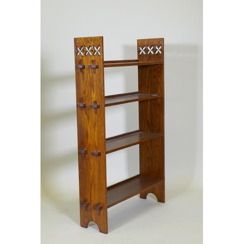 1026 - A Liberty style oak open book case, 72 x 20cm, 112cm high