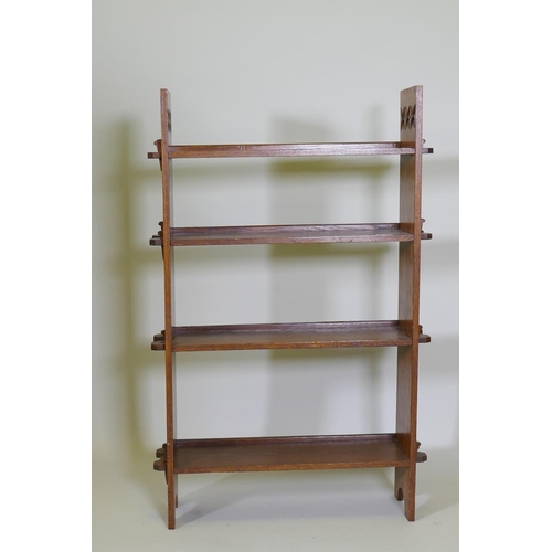 1026 - A Liberty style oak open book case, 72 x 20cm, 112cm high