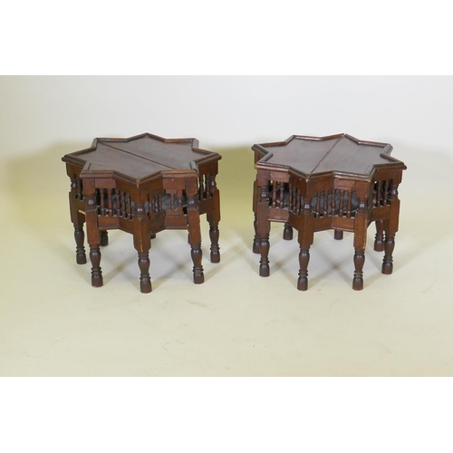 1030 - A pair of Moorish hardwood star shaped occasional tables with turned supports, 48cm diameter, 37cm h... 