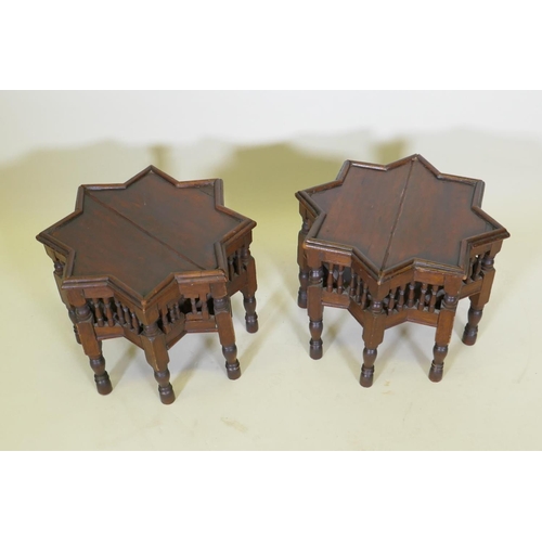 1030 - A pair of Moorish hardwood star shaped occasional tables with turned supports, 48cm diameter, 37cm h... 