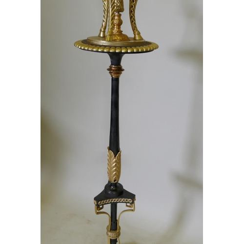 1031 - A pair of C19th Empire style iron and ormolu torcheres, adapted, 124cm high, 37cm diameter