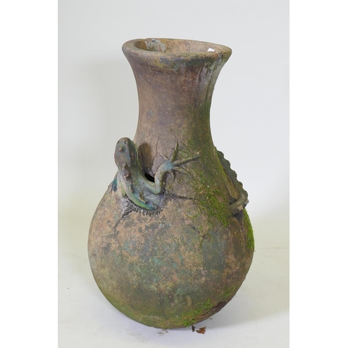 1037 - A terracotta garden vase with an applied and painted lizard, historic repair, 66cm high