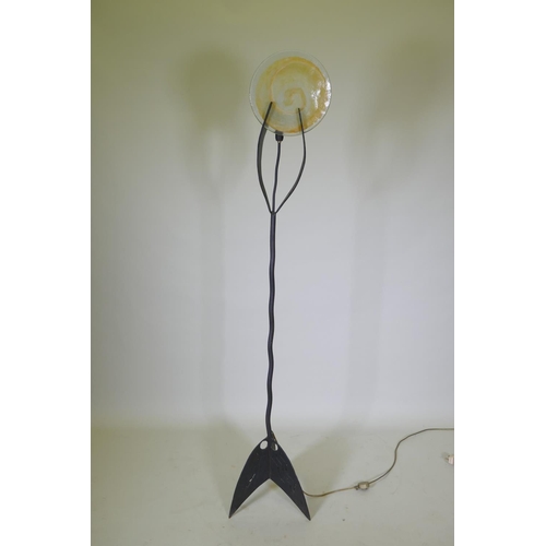 1039 - A contemporary wrought iron and glass standard lamp, 