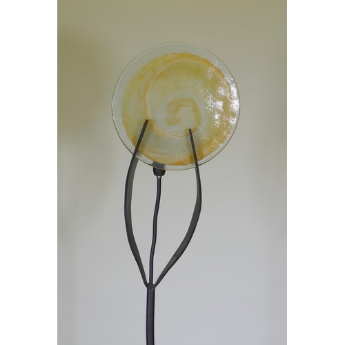 1039 - A contemporary wrought iron and glass standard lamp, 