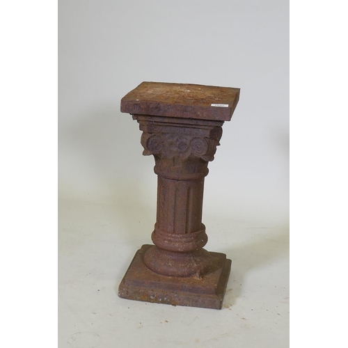 1042 - A cast iron pedestal in the form of a classical column, 25 x 25 x 50cm