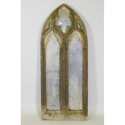 1043 - A composition Gothic style garden mirror, 58 x 145cm