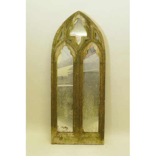 1043 - A composition Gothic style garden mirror, 58 x 145cm