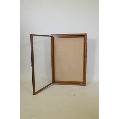 1049 - A wood framed shallow display cabinet, with metal framed glazed door, 60 x 90 6cm deep