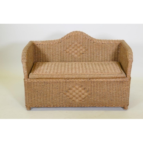 1057 - A wicker ottoman with lift up seat, 96 x 67cm high