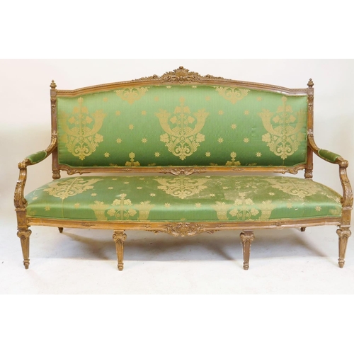 1059 - A C19th French style carved walnut settee, with shaped fronts, 180cm wide