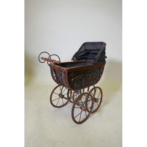 106 - A Victorian style doll's pram, 52 x 24 x 63cm