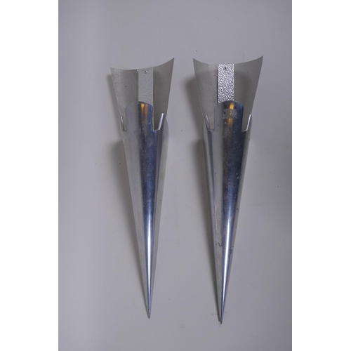 1060 - A pair of vintage French Art Deco style polished aluminium torchere wall sconces by Studio Naco for ... 