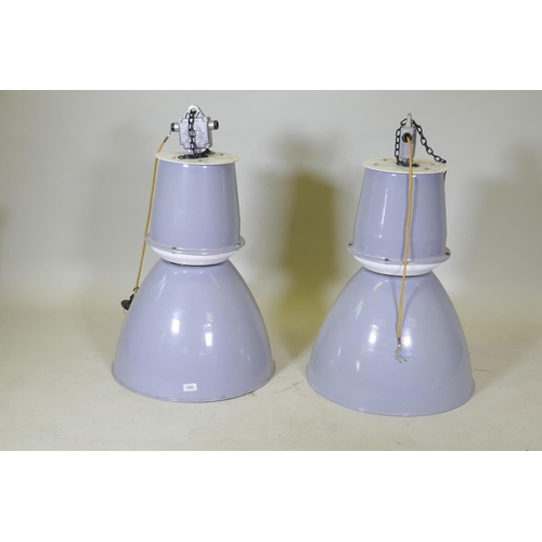 1062 - A pair of large industrial enamelled metal pendant lights, 84cm drop, 53cm diameter