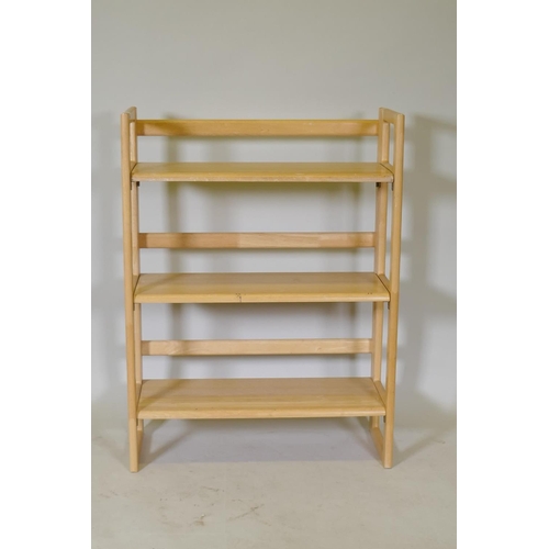 1067 - A beechwood folding display shelf, 28 x 72 x 95cm