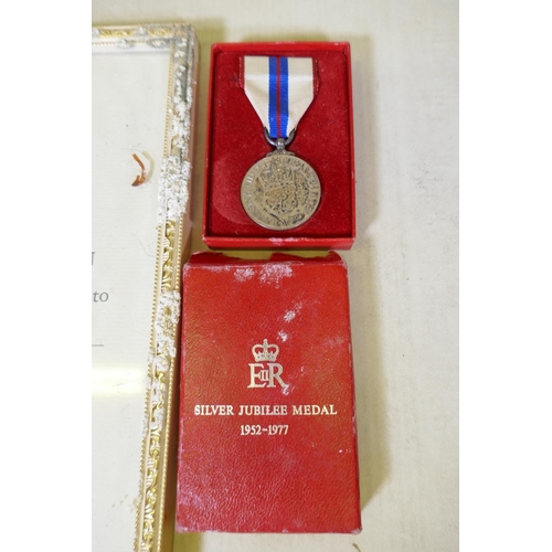 107 - An Elizabeth II Silver Jubilee medal with ribbon in original case, with citation