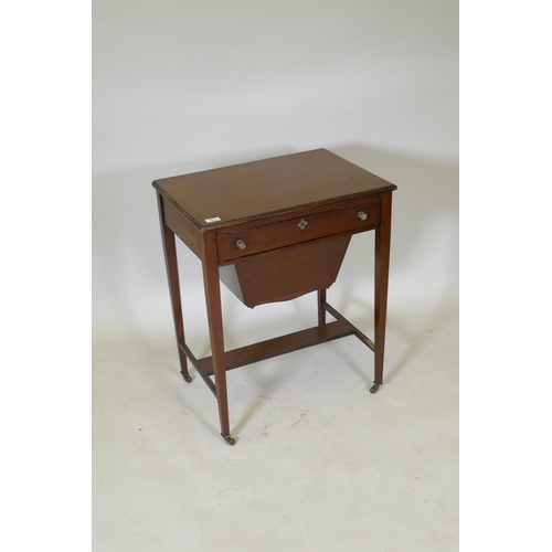 1074 - A C19th mahogany work table, the single drawer with fitted interior and pull out basket under, raise... 