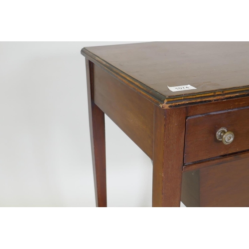 1074 - A C19th mahogany work table, the single drawer with fitted interior and pull out basket under, raise... 