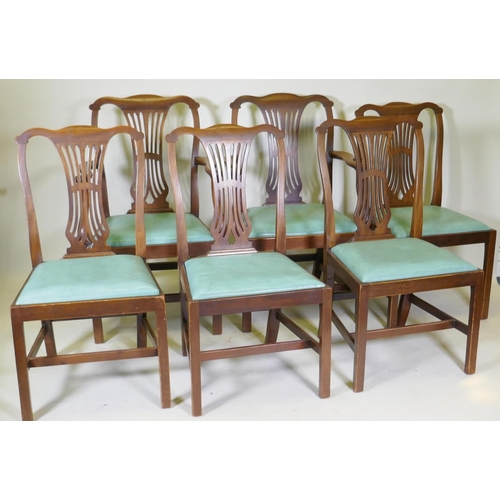 1076 - A set of six (four plus two) Georgian style mahogany dining chairs with pierced splat backs and drop... 