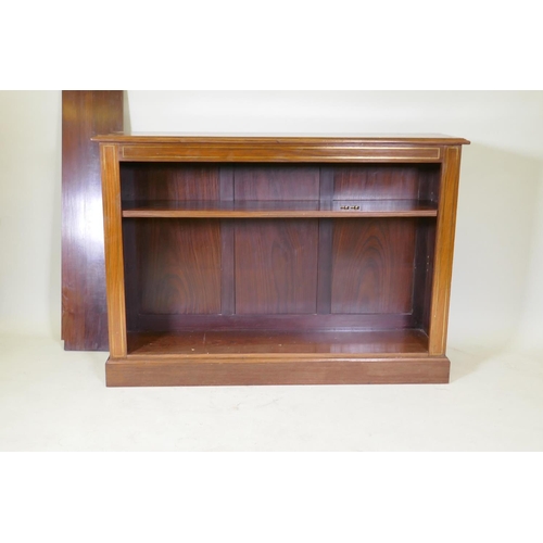 1082 - An Anglo-Indian rosewood open bookcase with brass inlaid decoration and two adjustable shelves, rais... 