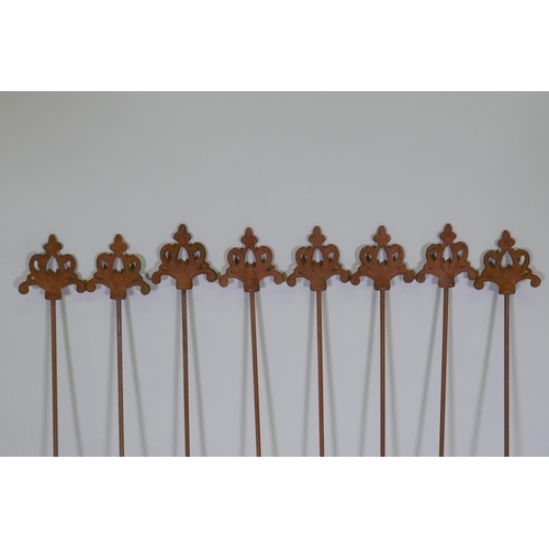 1085 - A set of eight cast iron gothic style plant stakes, 106cm long