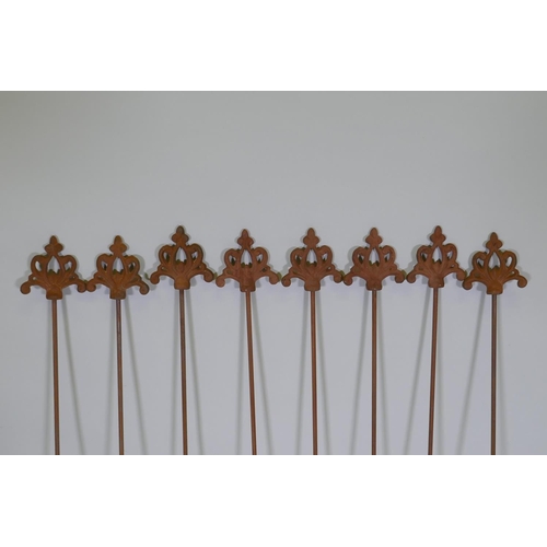 1086 - A set of eight cast iron gothic style plant stakes, 106cm long